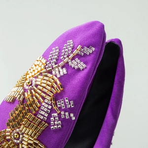Elegant purple fabric headband with handcrafted gold and silver bead embroidery