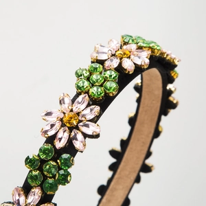Elegant wide headband featuring colorful crystal flower patterns on black satin fabric