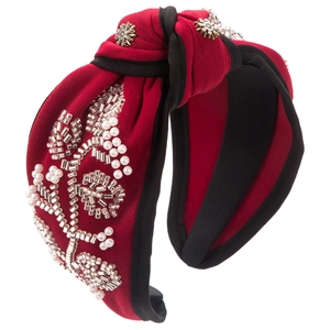 Beaded burgundy knotted headband with pearls and rhinestones on white background
