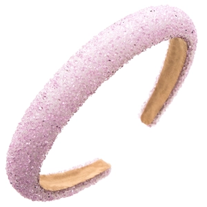 Vue détaillée du serre-tête rose avec cristaux scintillants et doublure en velours