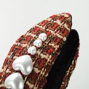 Elegant tweed headband with gold thread and heart-shaped pearls on a non-slip lining