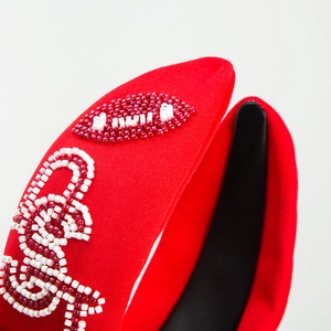 Fashionable red fabric headband with handmade beadwork rugby and letter embroidery