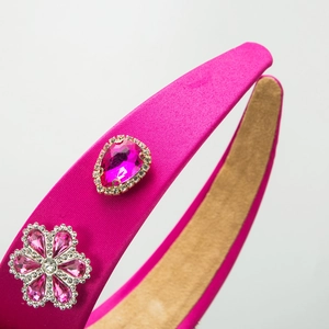 Baroque style fuchsia satin headband with pink floral jewels and pear-shaped crystals