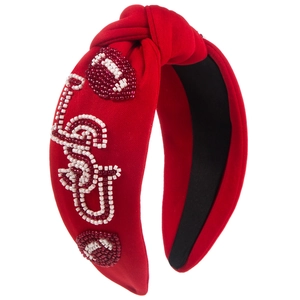 Red knotted fabric headband featuring handmade LOVE bead embroidery and rugby designs
