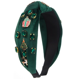 Detailed side view of dark green velvet headband with Christmas alloy enamel charms