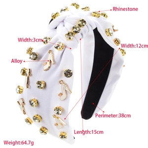 Baroque white knotted headband featuring gold alloy high heel charms and rhinestones