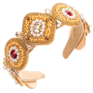 Detailed close-up of handmade baroque headband with crystals and cream pearls