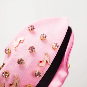 Baroque pink knotted headband with rhinestones and enamel high heel charms