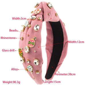Pink knotted fabric headband with rhinestones, enamel floral charms and metal beads