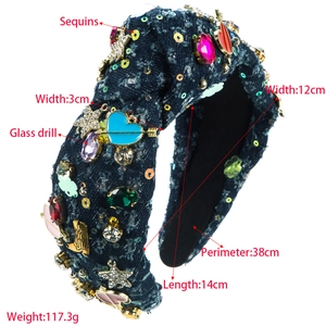 Handmade denim headband with colorful glass drills and metal heart accents on white background