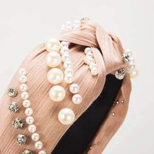 Elegant rose gold pleated headband with white imitation pearls and sparkling rhinestones