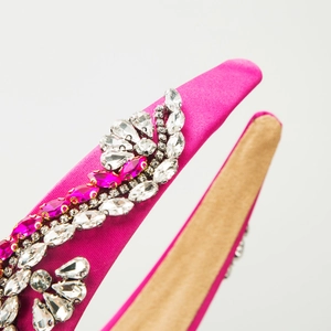 Baroque bright pink satin headband with elegant rhinestone patterns on white background