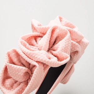 Pink waffle texture headband with layered fabric bows for elegant women fashion