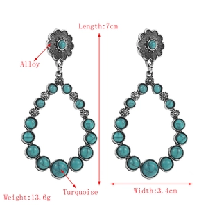 Bohemian vintage turquoise alloy drop earrings featuring daisy top and hollow design