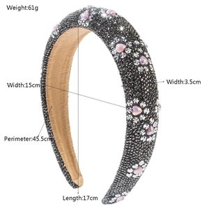 Sparkling rhinestone headband with pink heart gems and thick grey crystal padding