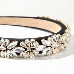 Close-up of sparkling crystal marquise flowers on a padded sponge headband fashion accessory
