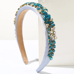 Luxurious wide padded headband with light blue satin and sparkling floral crystals