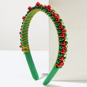 Christmas headband with red green and gold bells wrapped in gold wire on green fabric
