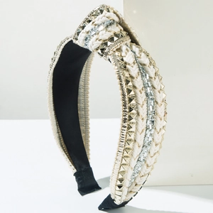 Padded knotted headband with gold pyramid studs, white braided rope, and sparkling rhinestones