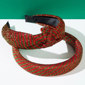 Detail of red and green sequined Christmas headbands with non-slip black lining