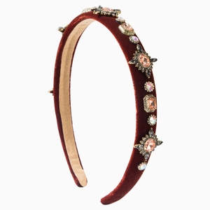 Baroque padded headband with red velvet and sparkling colorful rhinestones on white background