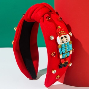 Serre-tête de Noël rouge noué avec motif Casse-Noisette en perles et cristaux fins