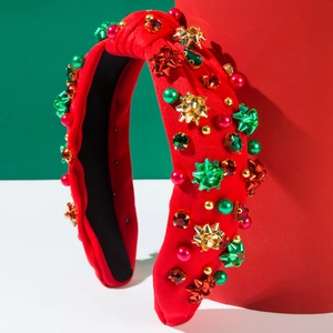 Cerchietto natalizio rosso in tessuto con strass festivi e ciondoli a forma di fiocco