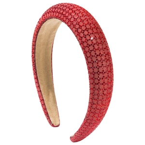 Serre-tête rembourré avec strass rouges et ornements en cristal sur fond blanc pur