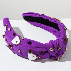 Texture détaillée du serre-tête nœud violet avec pendentif fantôme d'Halloween et cristaux