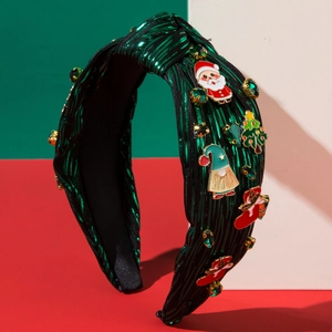 Sparkly green Christmas headband with enamel Santa and reindeer charms and green rhinestones