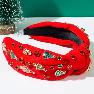 Detail of red knotted Christmas headband with alloy reindeer and rhinestone accents