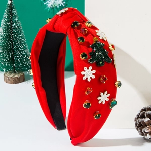 Détail du serre-tête rouge avec sapin en perles et flocons pour fêtes de Noël