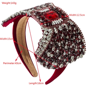 Luxury red velvet headband with sparkling crystals and a large ruby-style stone
