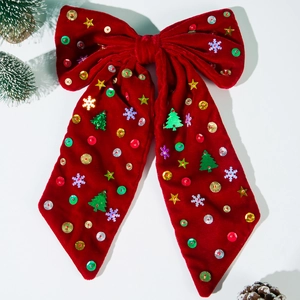 Fiocco natalizio in velluto rosso con paillettes, stelle e decori di alberi festivi