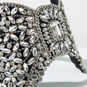 Macro shot of luxury bow headband featuring emerald-cut crystals and premium rhinestones