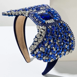 Detail of luxury navy velvet headband with sparkling blue crystals and rhinestones