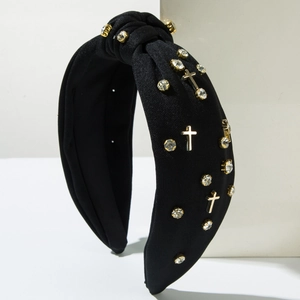 Knotted black fabric headband with sparkling rhinestones and gold metal cross charms