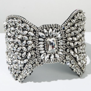 Macro shot of luxury crystal bow headband with rhinestones and rectangular center stone