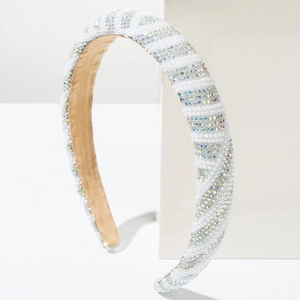 Sparkling white pearl and rhinestone padded headband for women with a stylish wave pattern