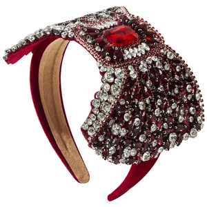 Luxury red velvet headband with sparkling crystals and a large ruby centerpiece for parties