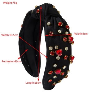 Sparkly black padded headband with heart rubies and rhinestones showing product dimensions