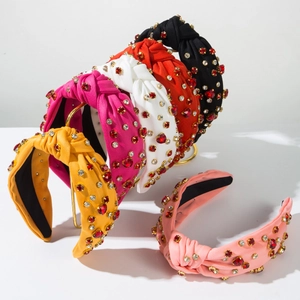 Sparkly padded headband with rhinestones in various colors for high cranial top style
