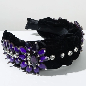 Detail of luxury braided velvet headband with hand-sewn purple crystals and rhinestones