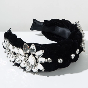 Detail view of woven black velvet headband featuring hand-sewn crystals and rhinestones