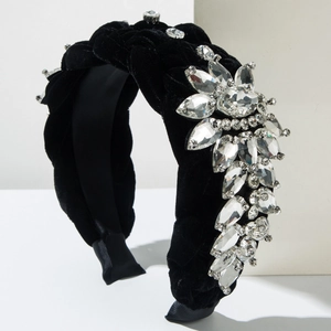 Close-up of velvet braided headband with sparkling crystal rhinestones for party wear