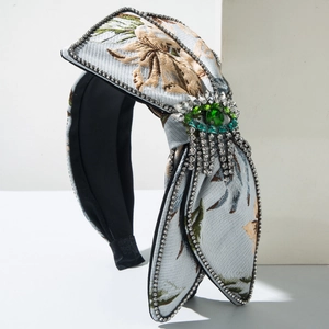Serre-tête vintage brodé de fleurs avec strass et pierre précieuse en forme d'œil