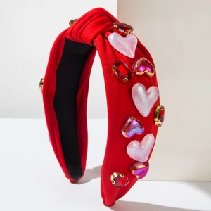 Roter Haarreif mit Knotendesign, Strasssteinen und perlmuttartigen Herzapplikationen