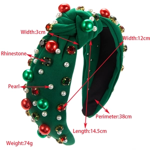Christmas headband with red and green pearls and rhinestones on knitted fabric