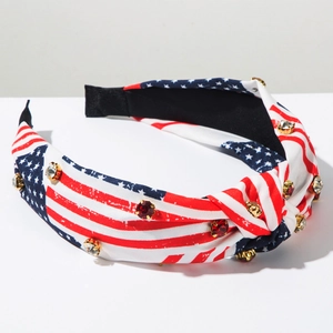 Macro shot of American flag knotted headband with red and clear rhinestones