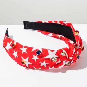 Macro detail of red Independence Day knot headband with white stars and rhinestones